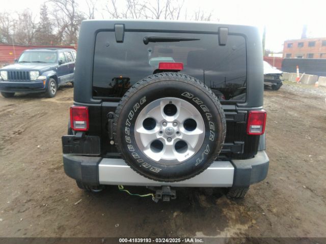 1C4AJWBG9EL161712 Jeep Wrangler Sahara
