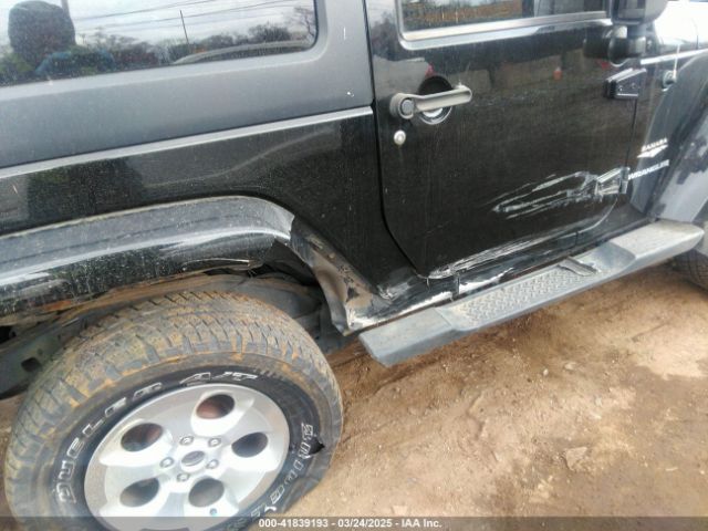 1C4AJWBG9EL161712 Jeep Wrangler Sahara