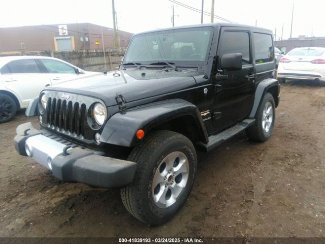1C4AJWBG9EL161712 Jeep Wrangler Sahara