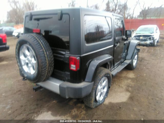 1C4AJWBG9EL161712 Jeep Wrangler Sahara