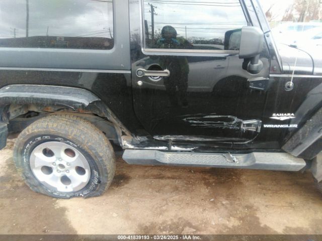 1C4AJWBG9EL161712 Jeep Wrangler Sahara