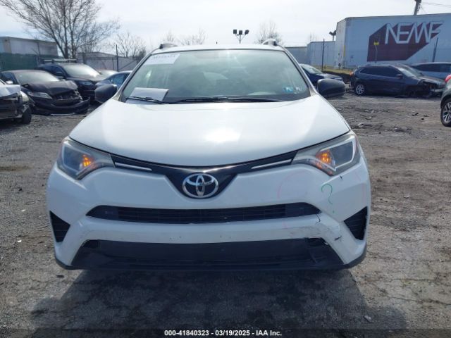 JTMBFREV9GJ097512 Toyota RAV4 LE