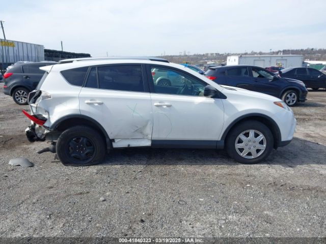 JTMBFREV9GJ097512 Toyota RAV4 LE