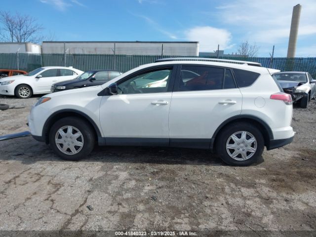 JTMBFREV9GJ097512 Toyota RAV4 LE