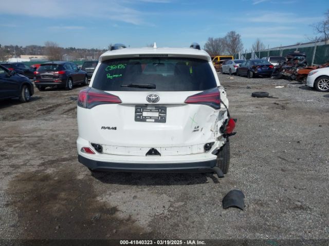 JTMBFREV9GJ097512 Toyota RAV4 LE