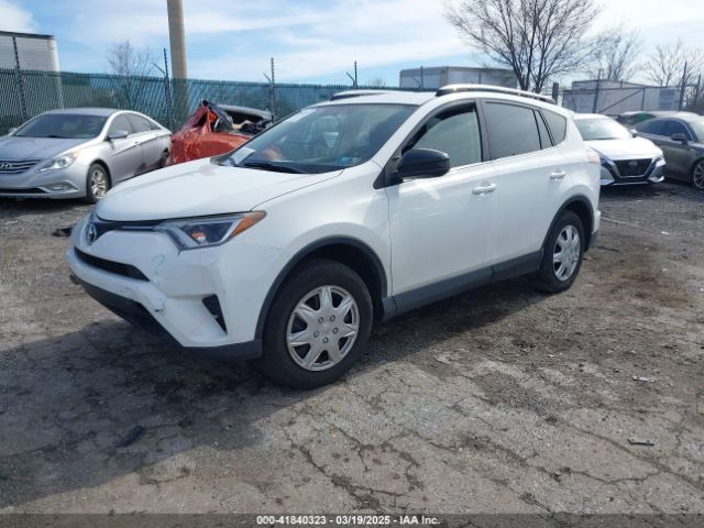 JTMBFREV9GJ097512 Toyota RAV4 LE