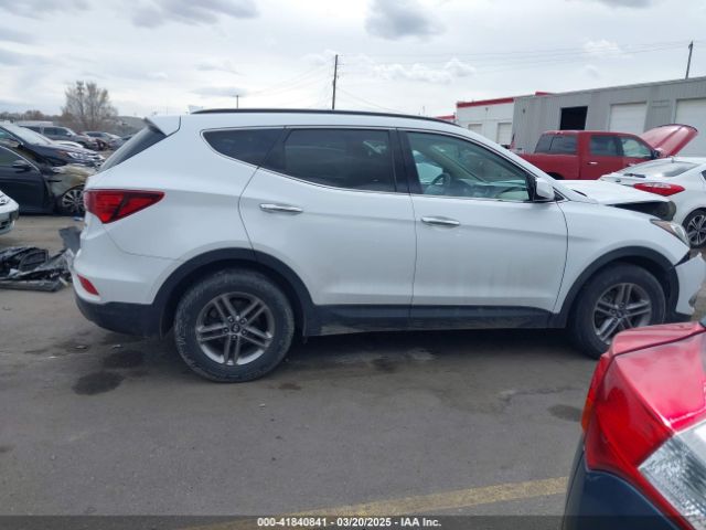 5NMZU3LB9HH011858 Hyundai Santa Fe Sport 2.4l