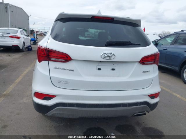 5NMZU3LB9HH011858 Hyundai Santa Fe Sport 2.4l