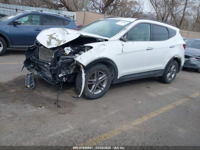 5NMZU3LB9HH011858 Hyundai Santa Fe Sport 2.4l