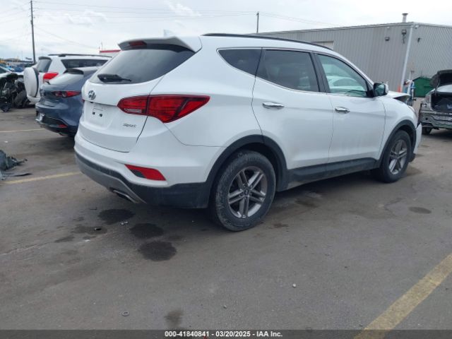5NMZU3LB9HH011858 Hyundai Santa Fe Sport 2.4l