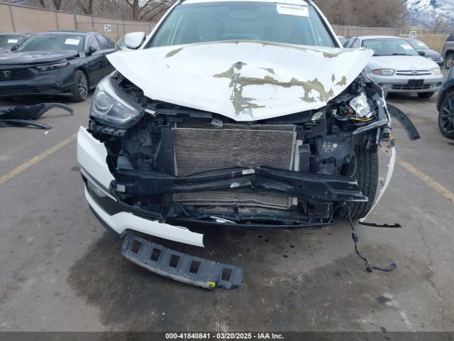 5NMZU3LB9HH011858 Hyundai Santa Fe Sport 2.4l