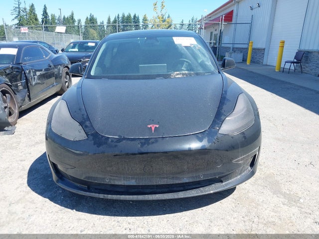 5YJ3E1EC9MF849817 Tesla 2021