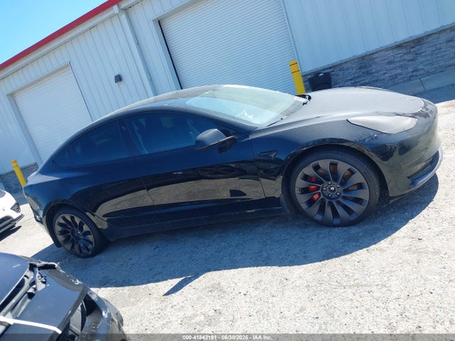 5YJ3E1EC9MF849817 Tesla 2021