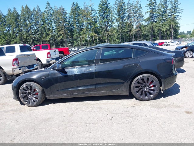 5YJ3E1EC9MF849817 Tesla 2021
