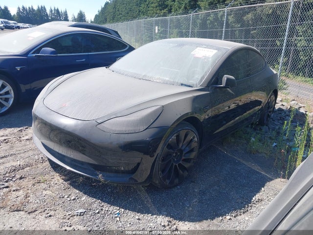 5YJ3E1EC9MF849817 Tesla 2021