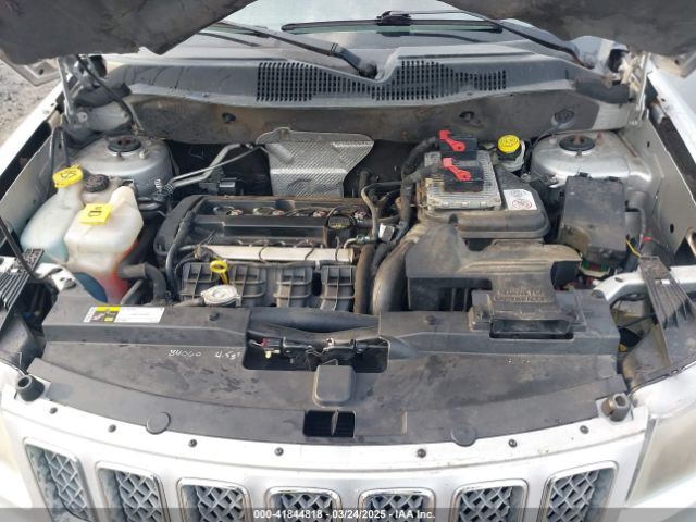 1C4NJCEA0ED586561 Jeep Compass Latitude