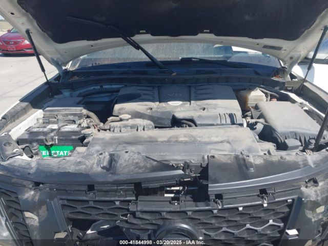 JN8AY2ND0JX000887 Nissan Armada Sl