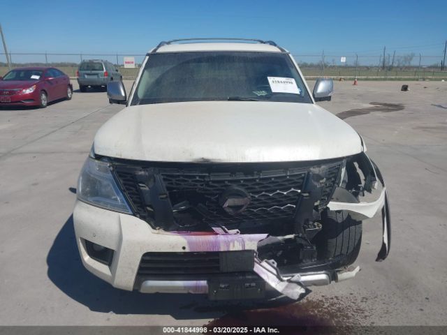 JN8AY2ND0JX000887 Nissan Armada Sl