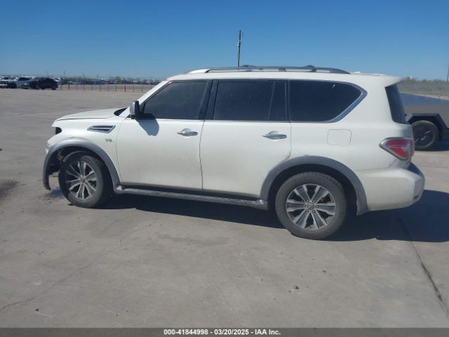 JN8AY2ND0JX000887 Nissan Armada Sl