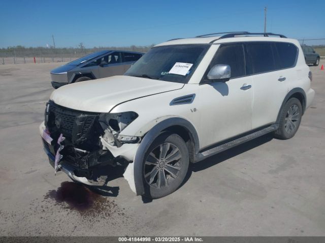 JN8AY2ND0JX000887 Nissan Armada Sl