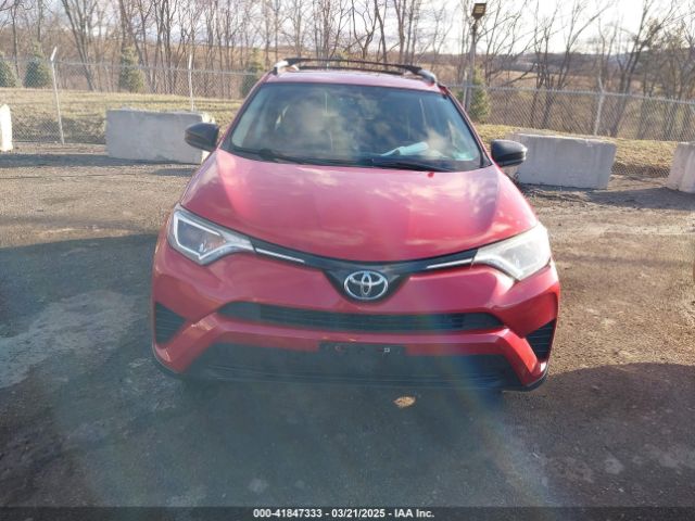 JTMBFREVXGJ100692 Toyota RAV4 LE
