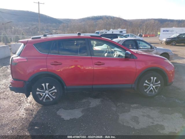 JTMBFREVXGJ100692 Toyota RAV4 LE