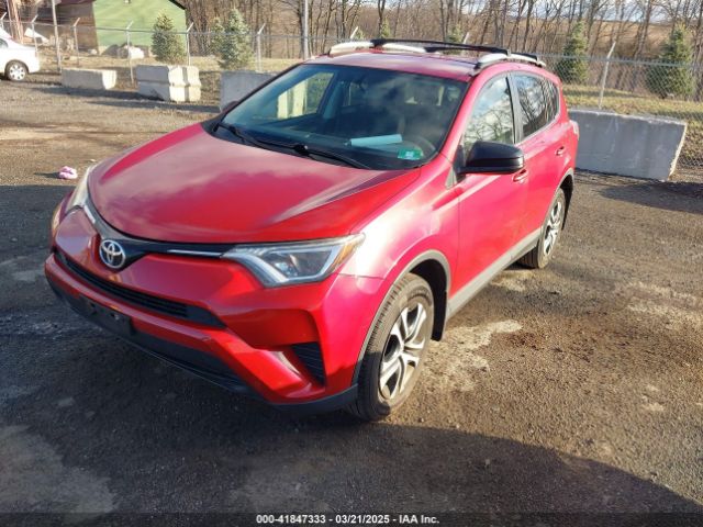 JTMBFREVXGJ100692 Toyota RAV4 LE