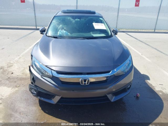 JHMFC1F95JX006736 Honda Civic Touring