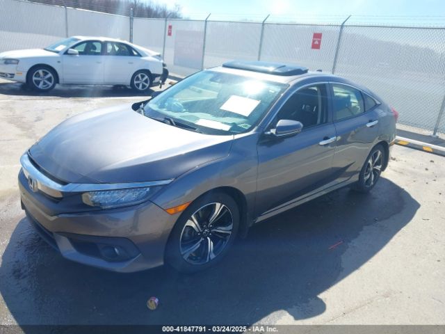 JHMFC1F95JX006736 Honda Civic Touring