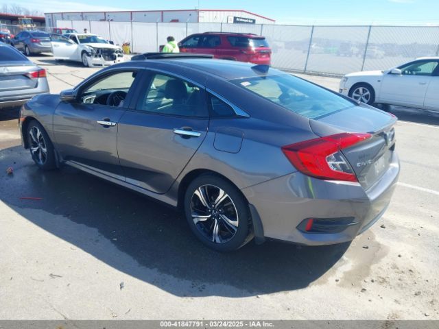 JHMFC1F95JX006736 Honda Civic Touring