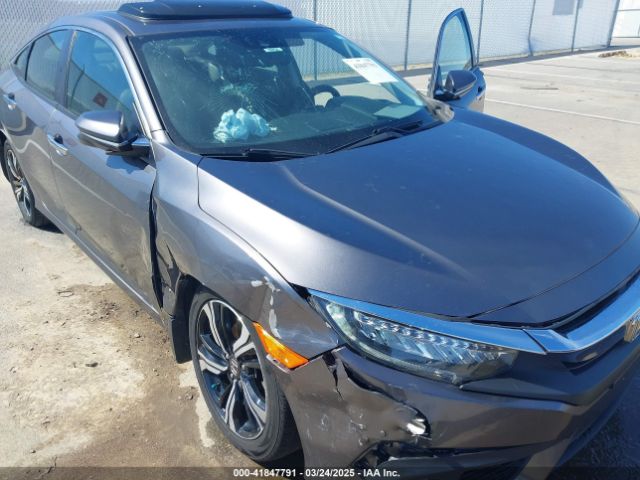 JHMFC1F95JX006736 Honda Civic Touring