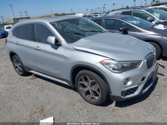 2018 BMW X1 WBXHT3Z34J4A67015