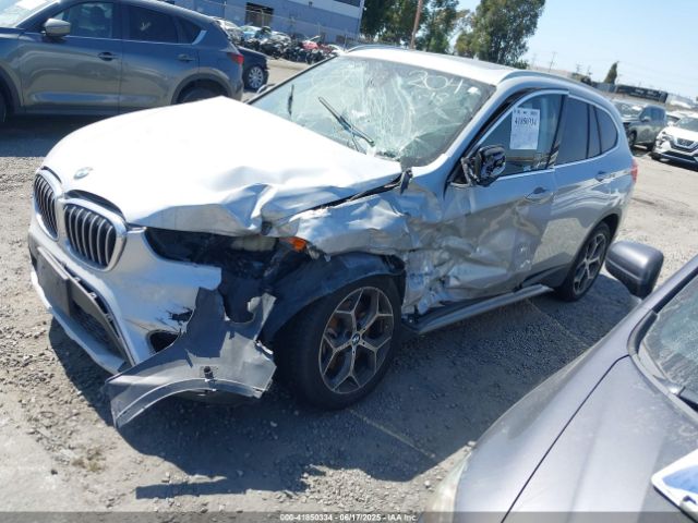 2018 BMW X1 WBXHT3Z34J4A67015 Photo 1