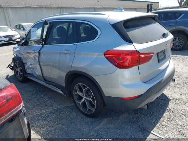 2018 BMW X1 WBXHT3Z34J4A67015 Photo 2