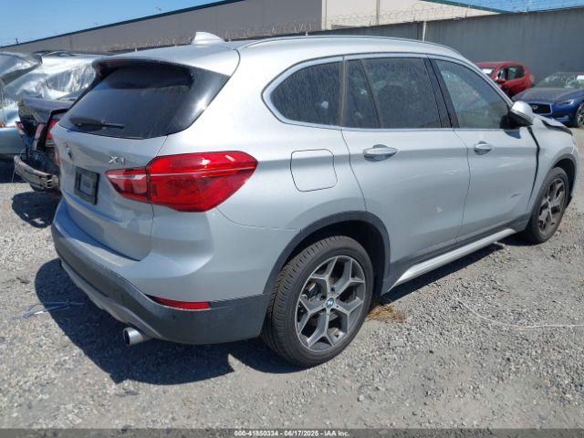 2018 BMW X1 WBXHT3Z34J4A67015 Photo 3
