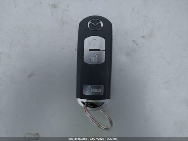 JM1DKBC77G0112529 Mazda Cx-3 Touring
