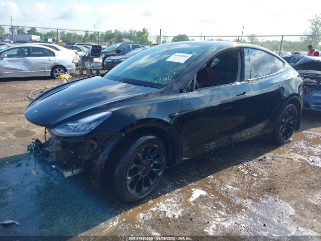 2021 TESLA MODEL Y 5YJYGAEE6MF137864 Photo 1