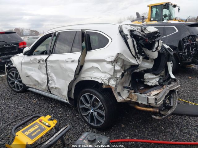 2017 BMW X1 WBXHT3C36H5F74818 Photo 2