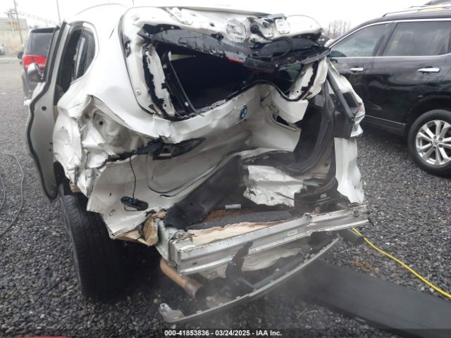 2017 BMW X1 WBXHT3C36H5F74818 Photo 5