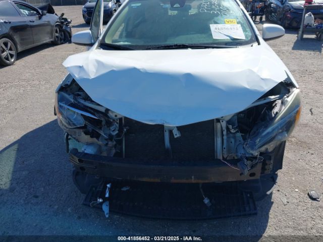 2T1BURHE5KC169697 Toyota COROLLA LE