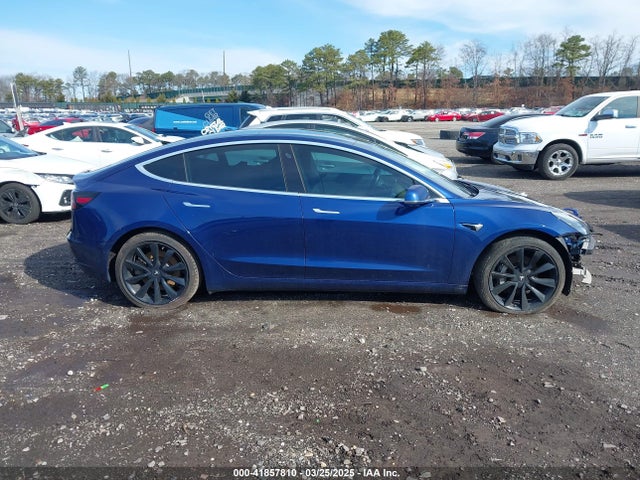 5YJ3E1EBXKF433036 Tesla 2019