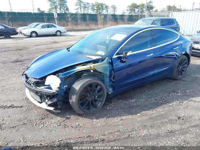 5YJ3E1EBXKF433036 Tesla 2019