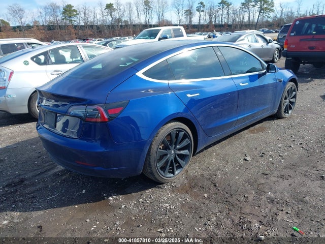 5YJ3E1EBXKF433036 Tesla 2019