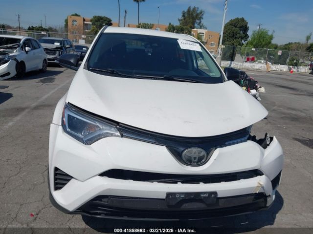JTMZFREV0JJ161653 Toyota RAV4 LE