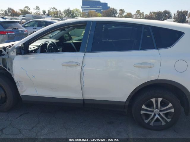 JTMZFREV0JJ161653 Toyota RAV4 LE