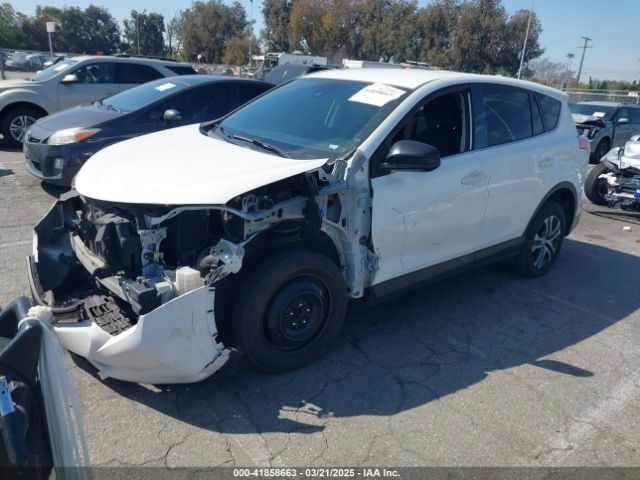 JTMZFREV0JJ161653 Toyota RAV4 LE
