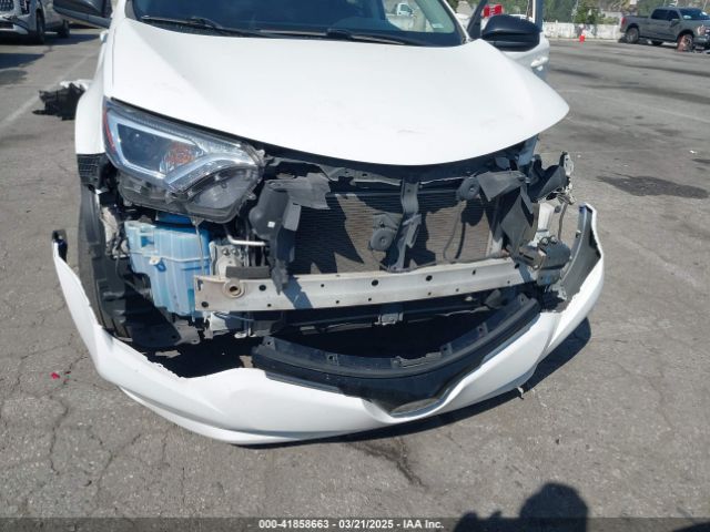 JTMZFREV0JJ161653 Toyota RAV4 LE