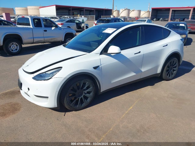 2021 TESLA MODEL Y 5YJYGAEE3MF194197 Photo 1