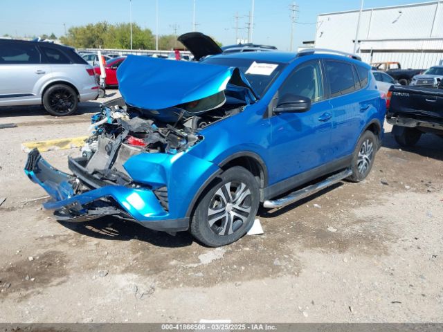JTMBFREV8GD197535 Toyota RAV4 LE