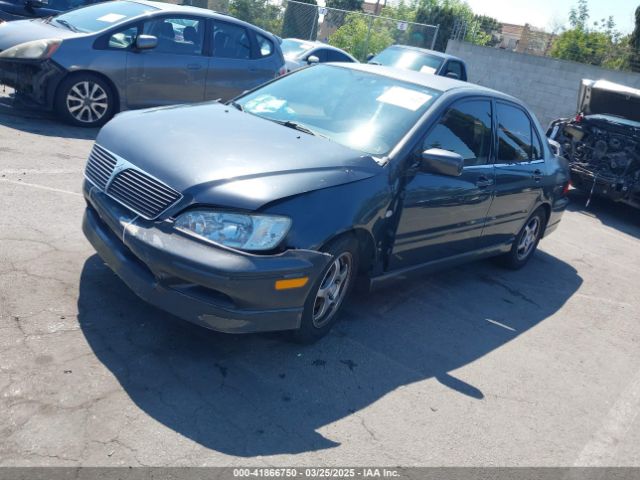 2002 MITSUBISHI LANCER JA3AJ86E62U047174 Photo 1